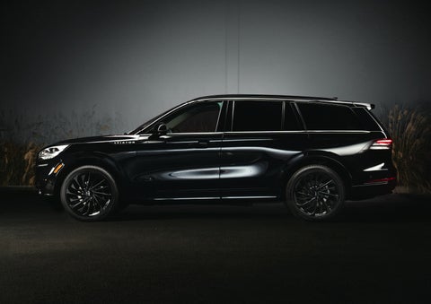 A 2024 Lincoln Aviator® SUV is shown in the Infinite Black exterior color | Biondi Lincoln in Monroeville PA