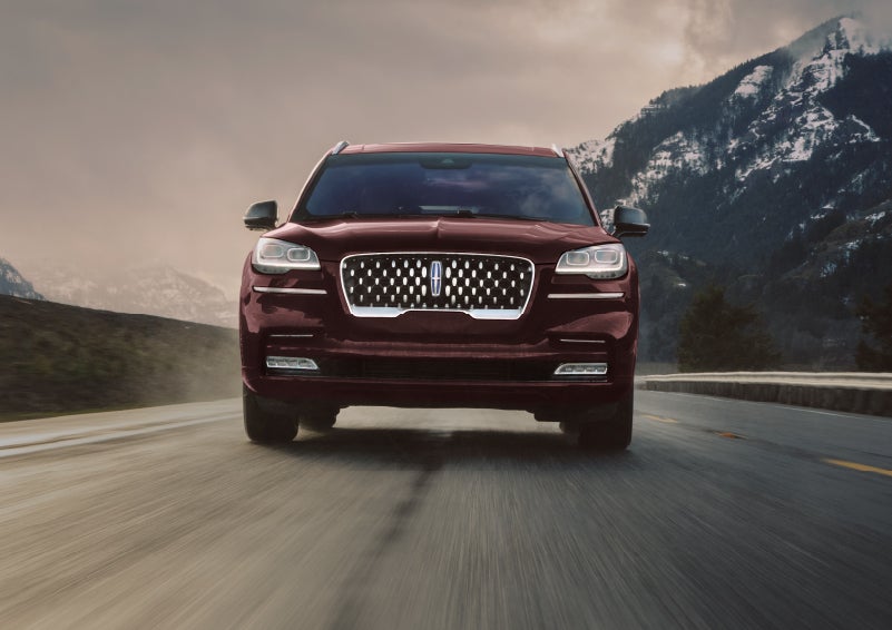 A 2024 Lincoln Aviator® SUV is shown in the Diamond Red exterior color. | Biondi Lincoln in Monroeville PA