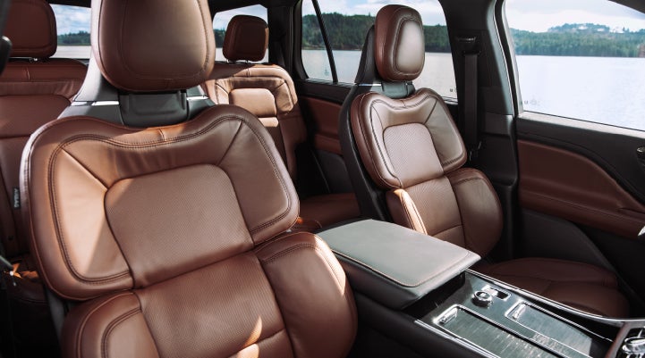 The front row's Perfect Position Seats in a 2024 Lincoln Aviator® Reserve model with Ebony Roast interior | Biondi Lincoln in Monroeville PA