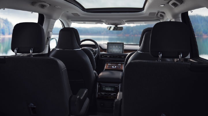 The interior of a 2024 Lincoln Aviator® SUV from behind the second row | Biondi Lincoln in Monroeville PA
