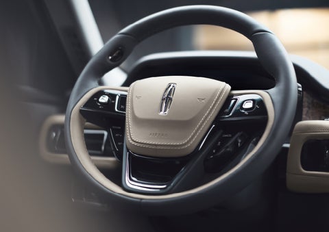 The intuitively placed controls of the steering wheel on a 2024 Lincoln Aviator® SUV | Biondi Lincoln in Monroeville PA