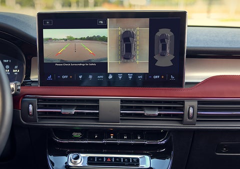 The driver of a 2024 Lincoln Corsair® SUV is shown selecting the drive mode. | Biondi Lincoln in Monroeville PA