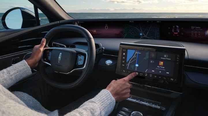 The driver of a 2024 Lincoln Nautilus® SUV interacts with the new Lincoln Digital Experience. | Biondi Lincoln in Monroeville PA