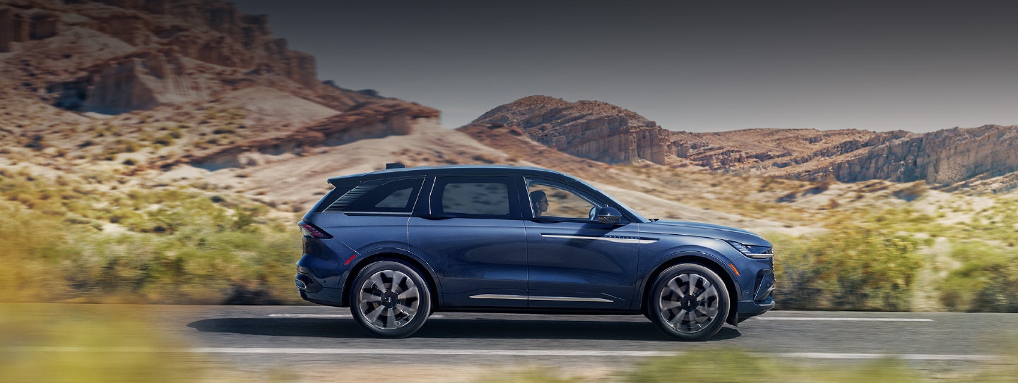 A 2024 Lincoln Nautilus® SUV is being driven in a desert setting. | Biondi Lincoln in Monroeville PA