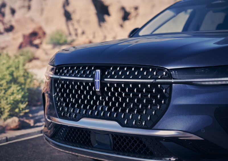 The stylish grille of a 2024 Lincoln Nautilus® SUV sparkles in the sunlight. | Biondi Lincoln in Monroeville PA
