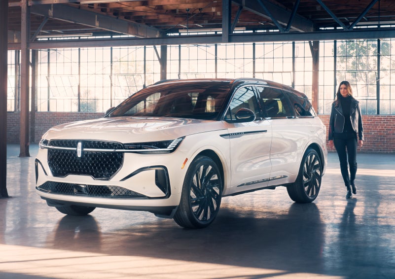 A person approaches a 2024 Lincoln Nautilus® SUV. | Biondi Lincoln in Monroeville PA