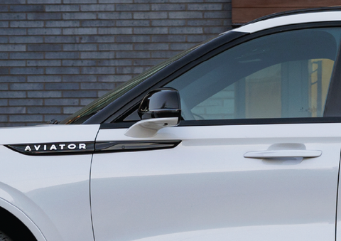 The driver’s door of a white 2025 Lincoln Aviator® SUV is showcased. | Biondi Lincoln in Monroeville PA