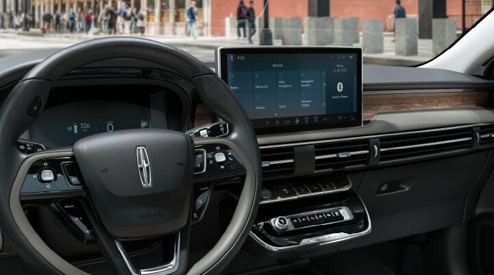 The center screen of the new 2025 Lincoln Corsair® SUV is showcased with its SYNC® 4 capabilities highlighted | Biondi Lincoln in Monroeville PA