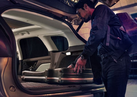 The driver of a 2024 Lincoln Corsair® SUV is shown selecting the drive mode. | Biondi Lincoln in Monroeville PA