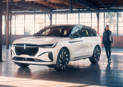 A person approaches a 2025 Lincoln Nautilus® SUV. | Biondi Lincoln in Monroeville PA