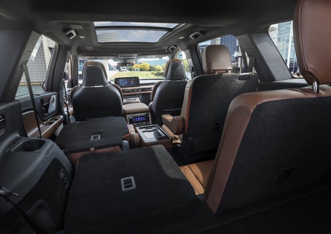 One side of the PowerFold® third-row seat and a second-row seat are folded forward in the 2026 Lincoln Aviator® SUV. | Biondi Lincoln in Monroeville PA