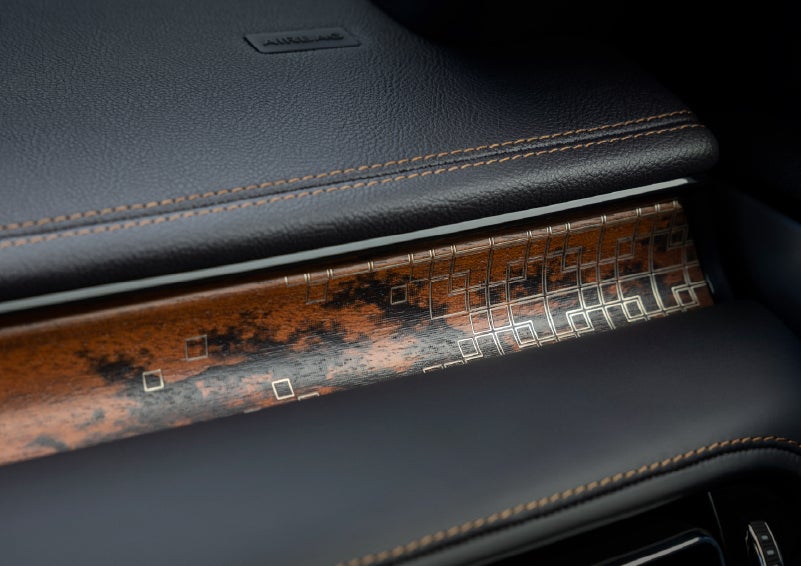 A close-up shot of the 2026 Lincoln Aviator® dashboard with unique black and brown accents and brown stitching. | Biondi Lincoln in Monroeville PA