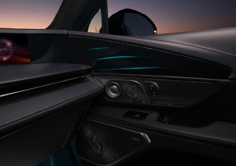 Selectable ambient lighting glows in the passenger door panel. | Biondi Lincoln in Monroeville PA