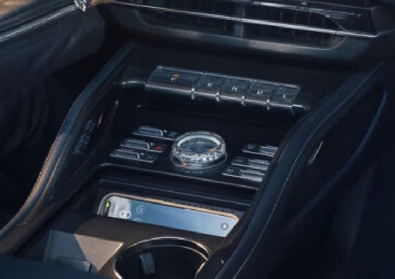 A smartphone is shown charging in the wireless charging pad. | Biondi Lincoln in Monroeville PA