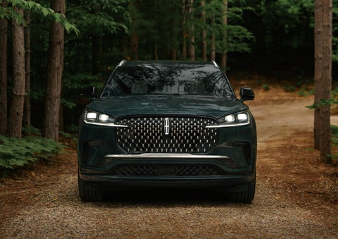 The front grille of a 2027 Lincoln Aviator® Black Label™ SUV is shown. | Biondi Lincoln in Monroeville PA
